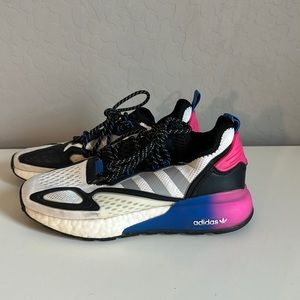 Kid’s adidas tennis shoes. Kids size 5.5. Fits women 7.5.